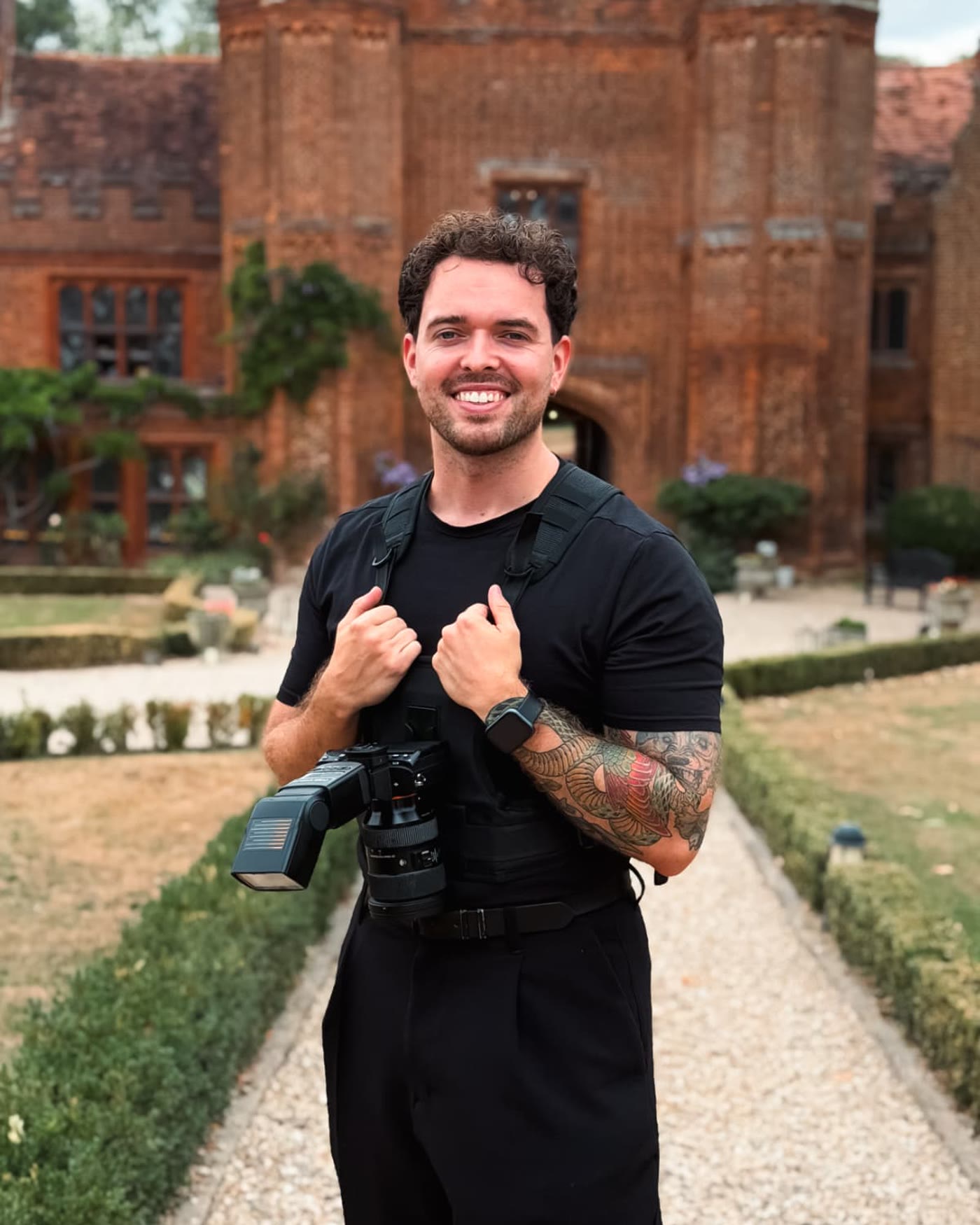 Connor Hatch outside a wedding venue, camera on a harness
